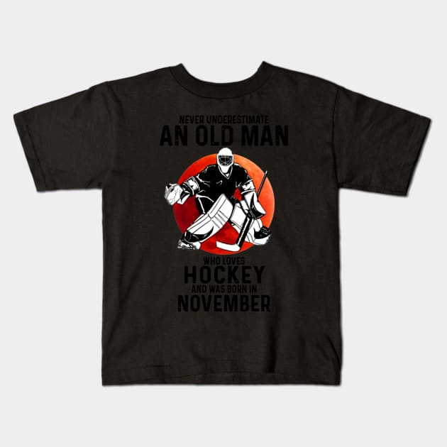 November Man Never Underestimate An Old Man Who Loves Hockey Kids T-Shirt by sueannharley12